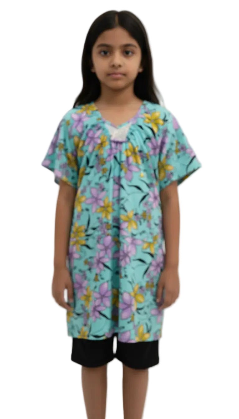 Girl wearing a floral dress with a white background