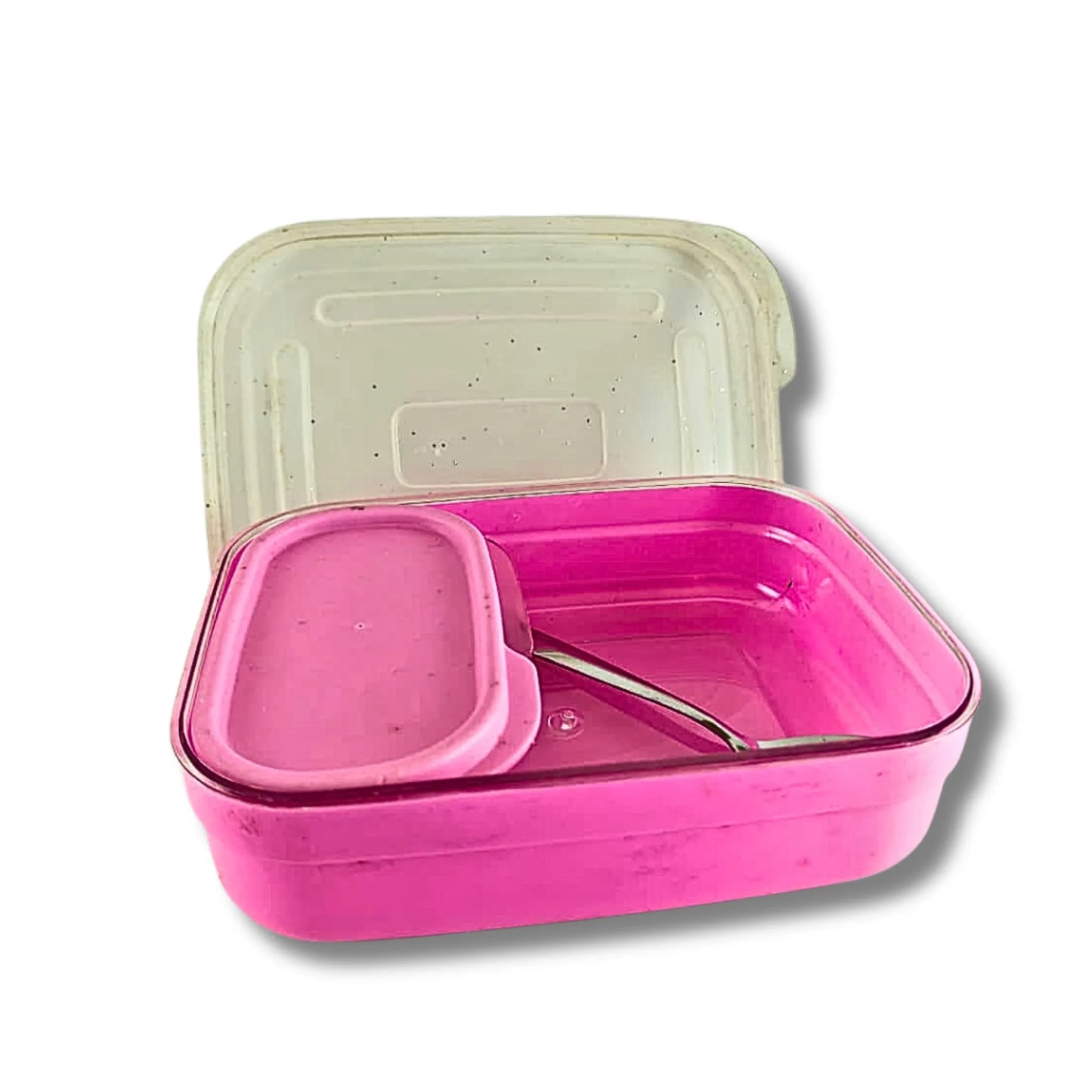 Pink bento box with a white lid on a white background