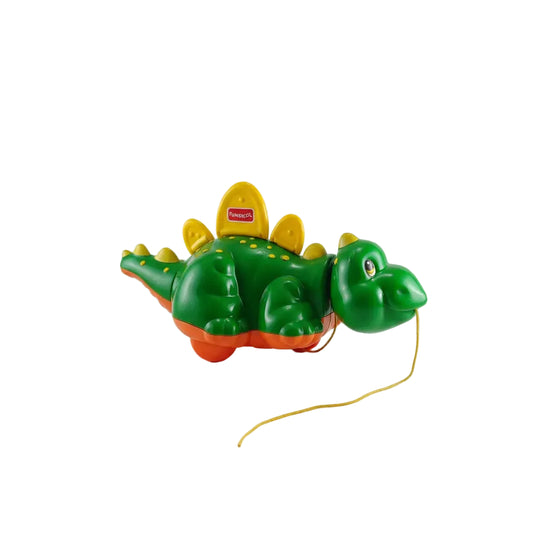 Toy Crocodile with a yellow string on a white background
