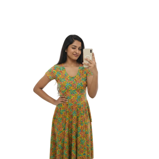 Woman taking a mirror selfie wearing a floral dress against a white background