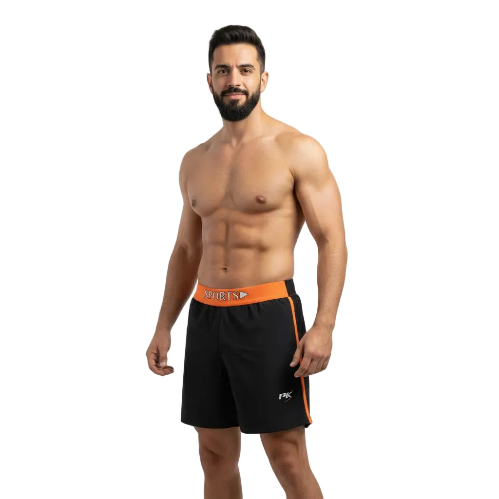Man wearing black shorts with orange waistband on a white background