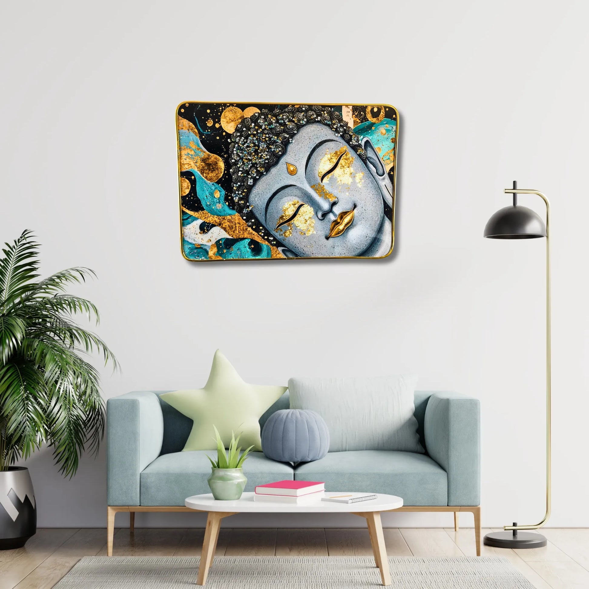 Living room with a gray sofa, decorative pillows, and a wall art piece of a Buddha face.