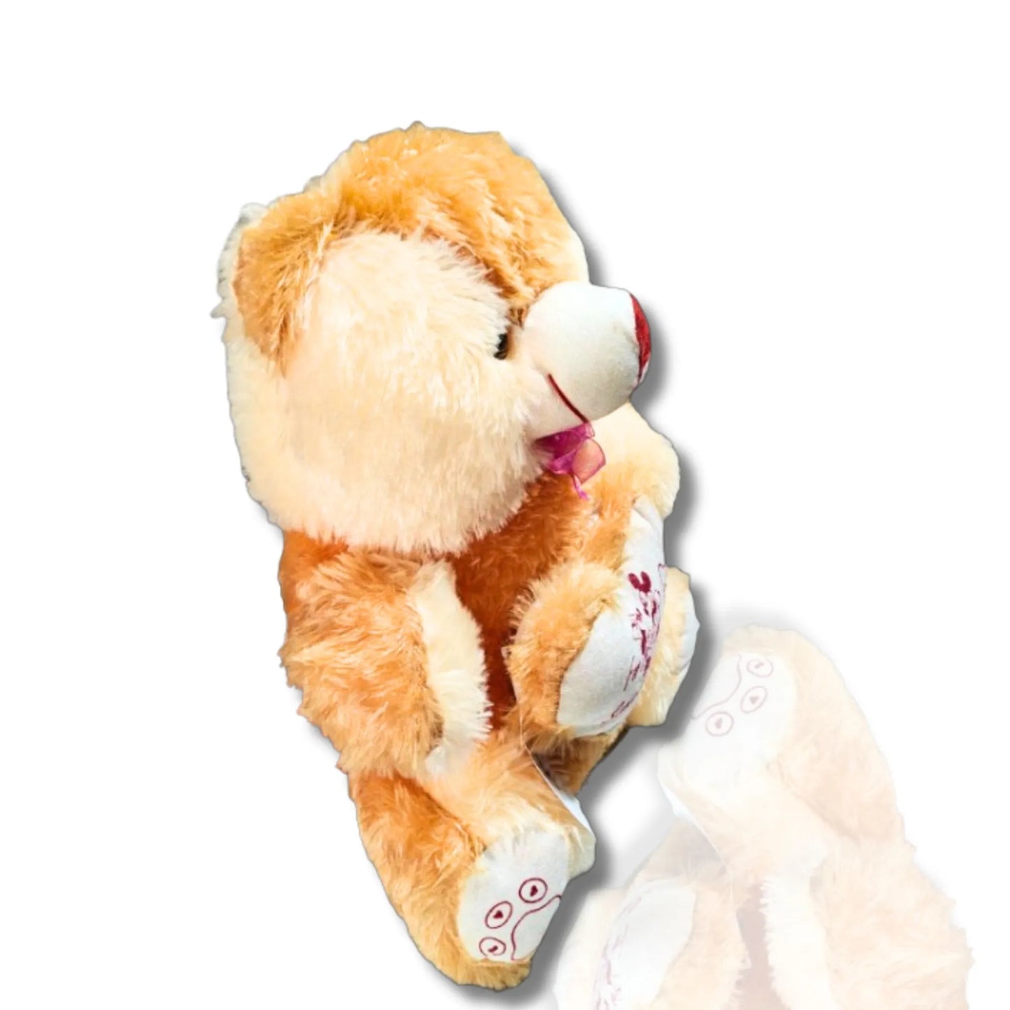 Plush toy bear with a heart on a white background