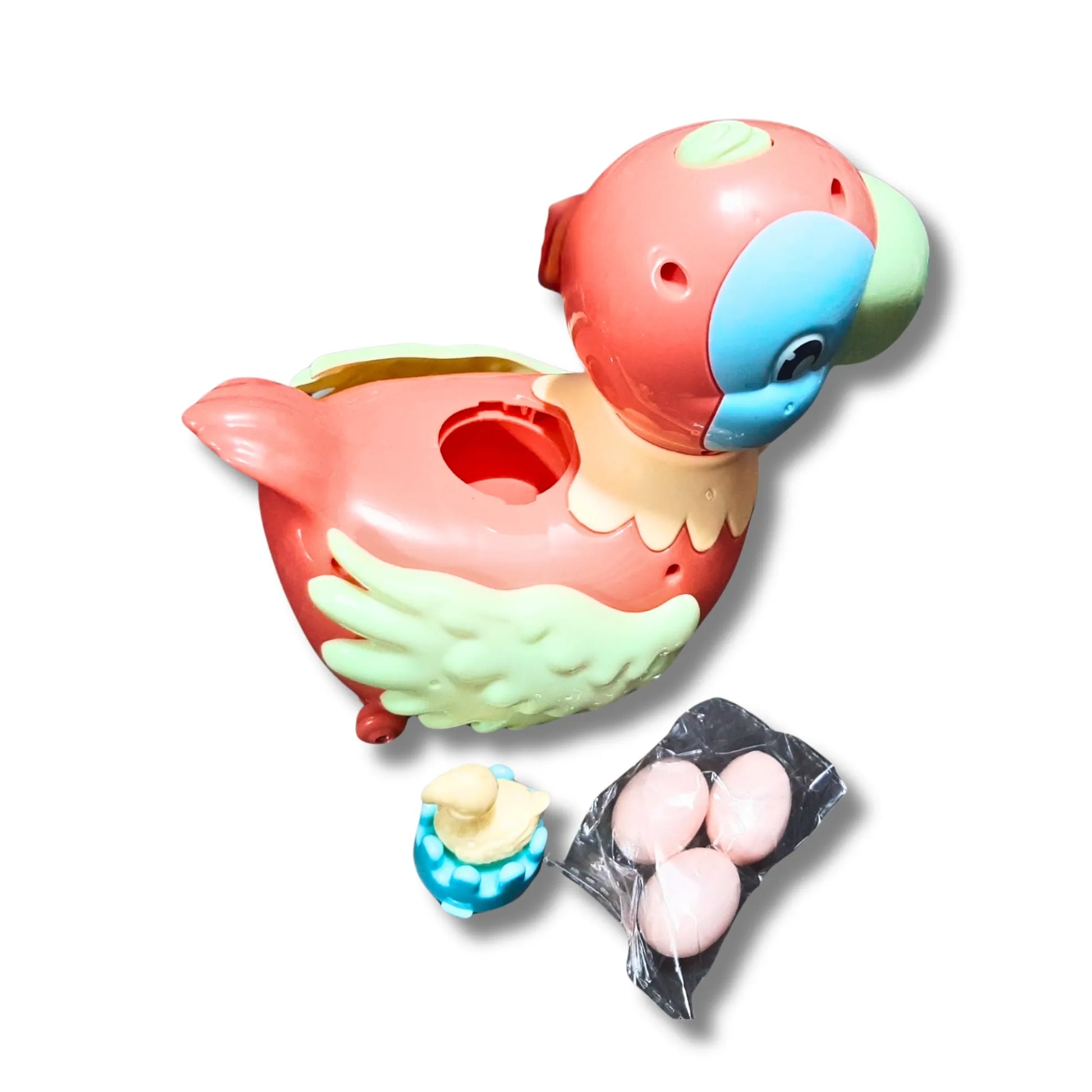 Colorful duck-shaped toy with small items on a white background