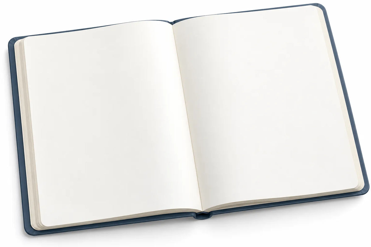 An open notebook with blank white pages and a dark navy blue cover, shown on a clean white background.