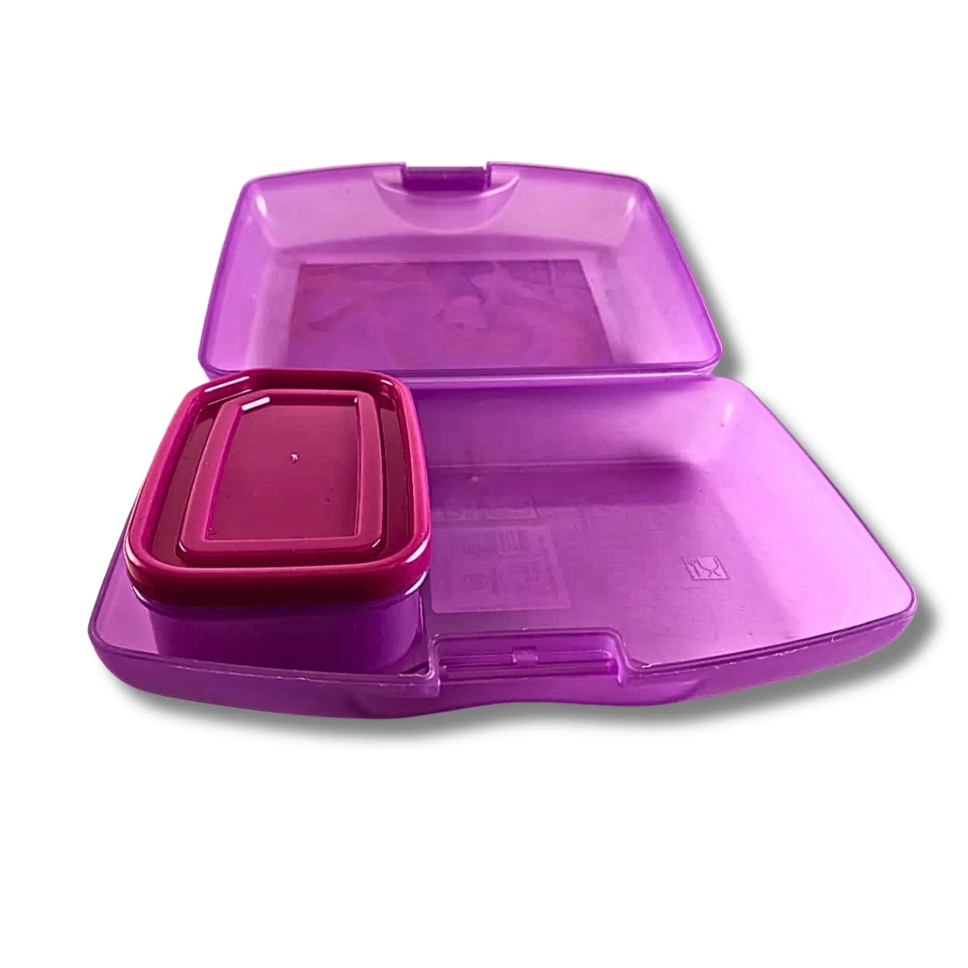 Purple plastic tray with a smaller red tray inside on a white background
