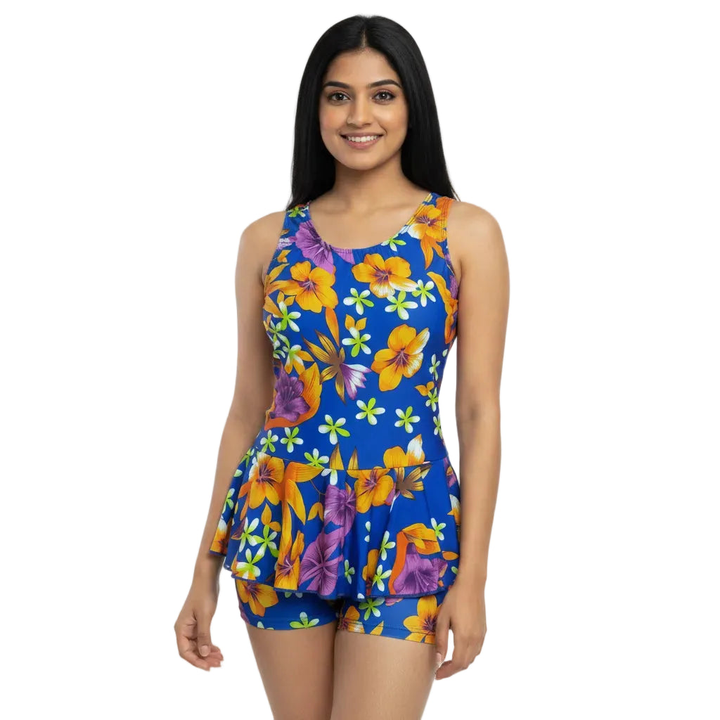 Woman wearing a colorful floral dress on a white background