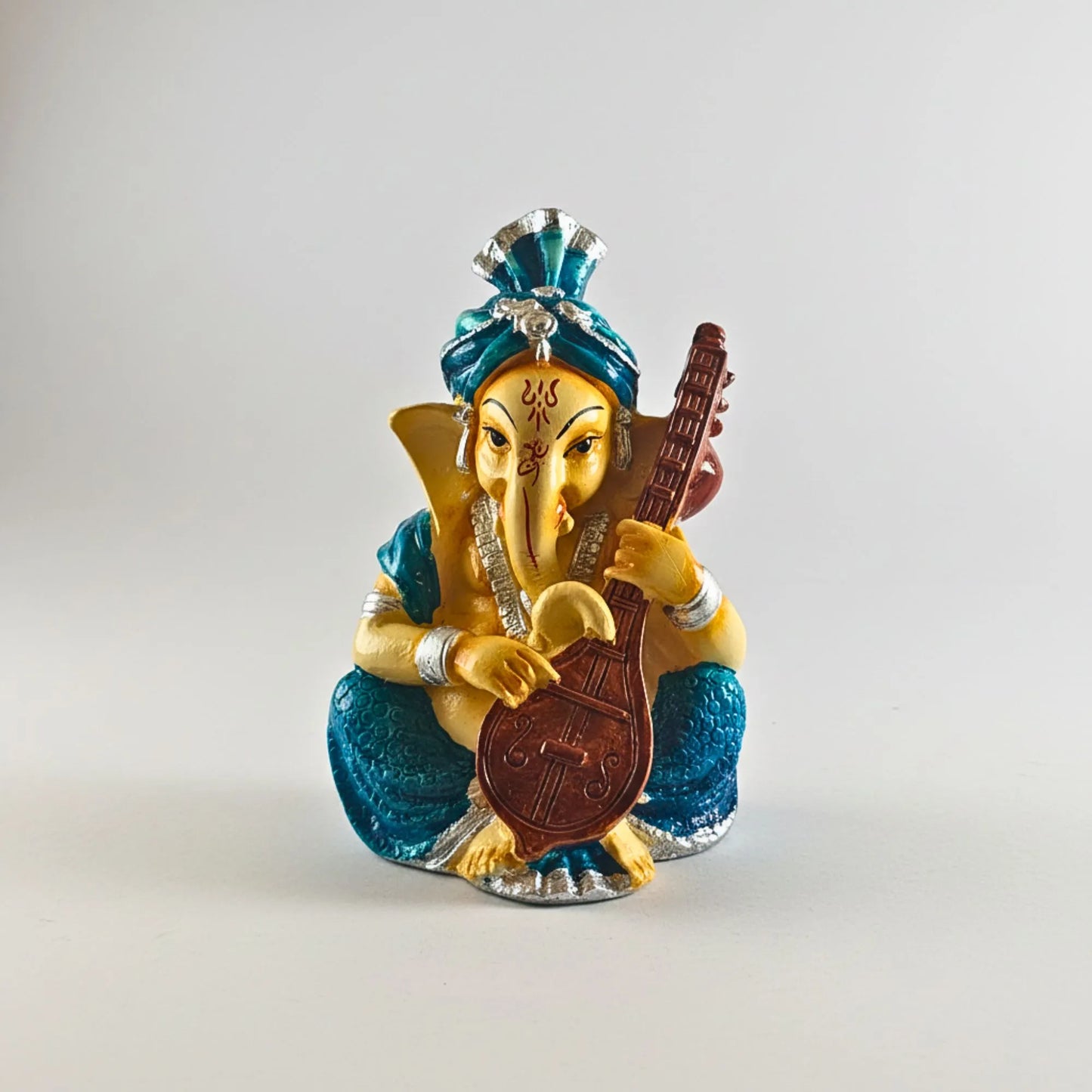 Musical Ganesha Idol Figurine Set | Golden Yellow with Turquoise and Pink, Playing Instruments, 12x8 cm, 2 Pieces