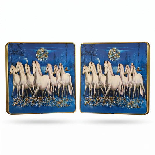 Pair of decorative plates with a horse design on a blue background