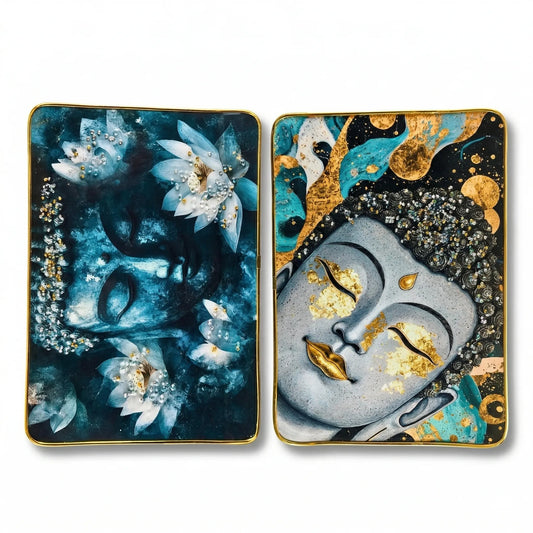 Two decorative face masks with floral and abstract designs on a white background