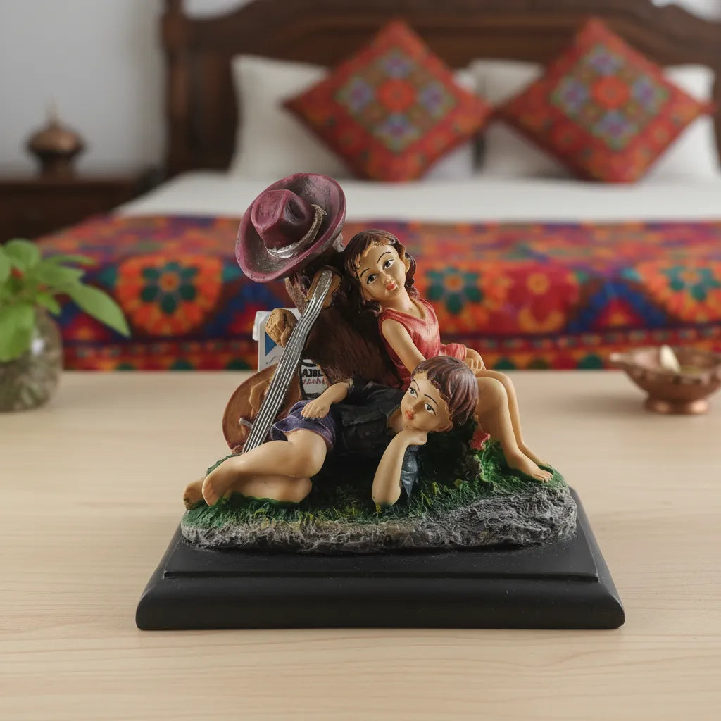Decorative figurine of a family on a bed with colorful bedding