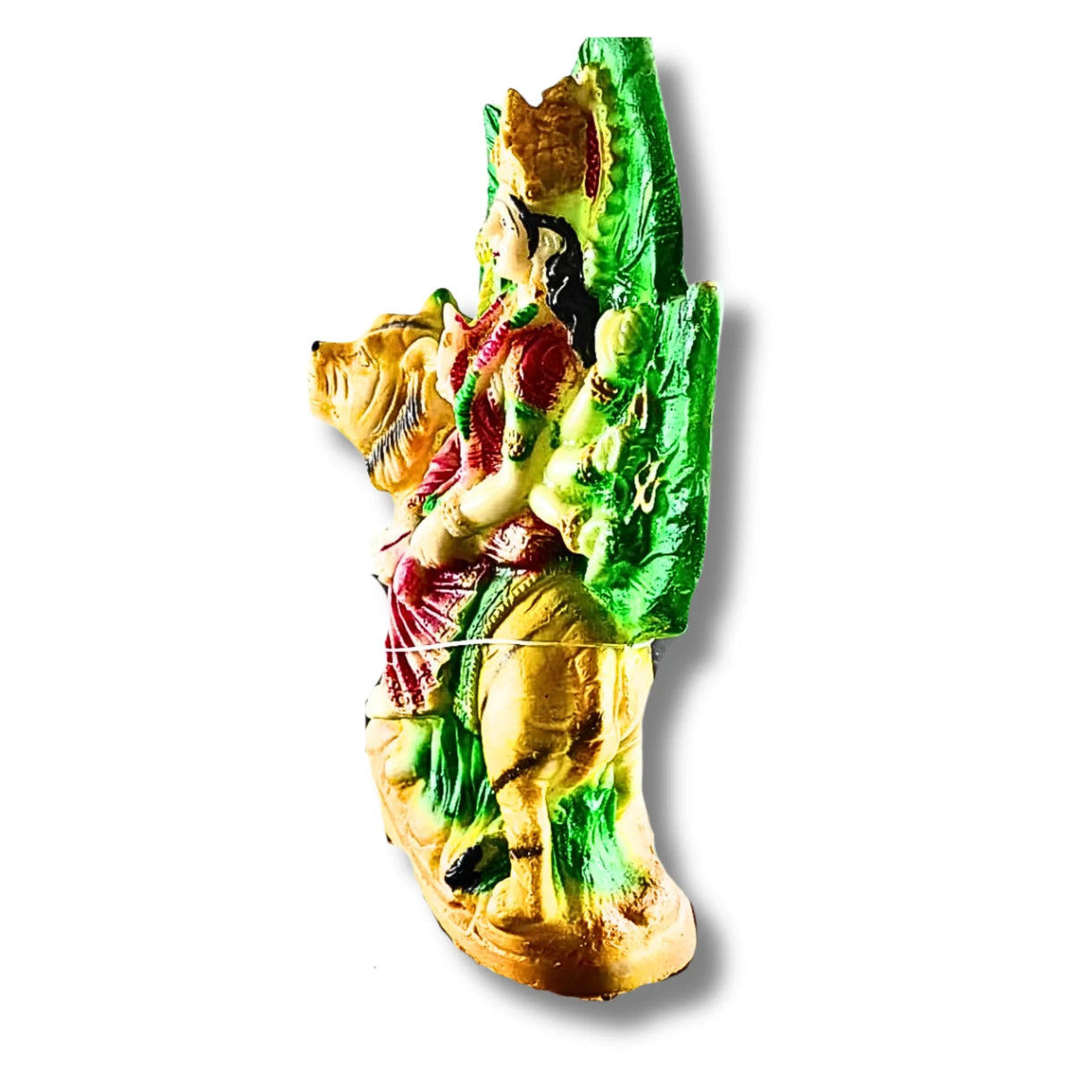 A small multicolored figurine of a woman riding a Lion, with green leaf-like elements and gold/yellow tones, shown against a plain white background.