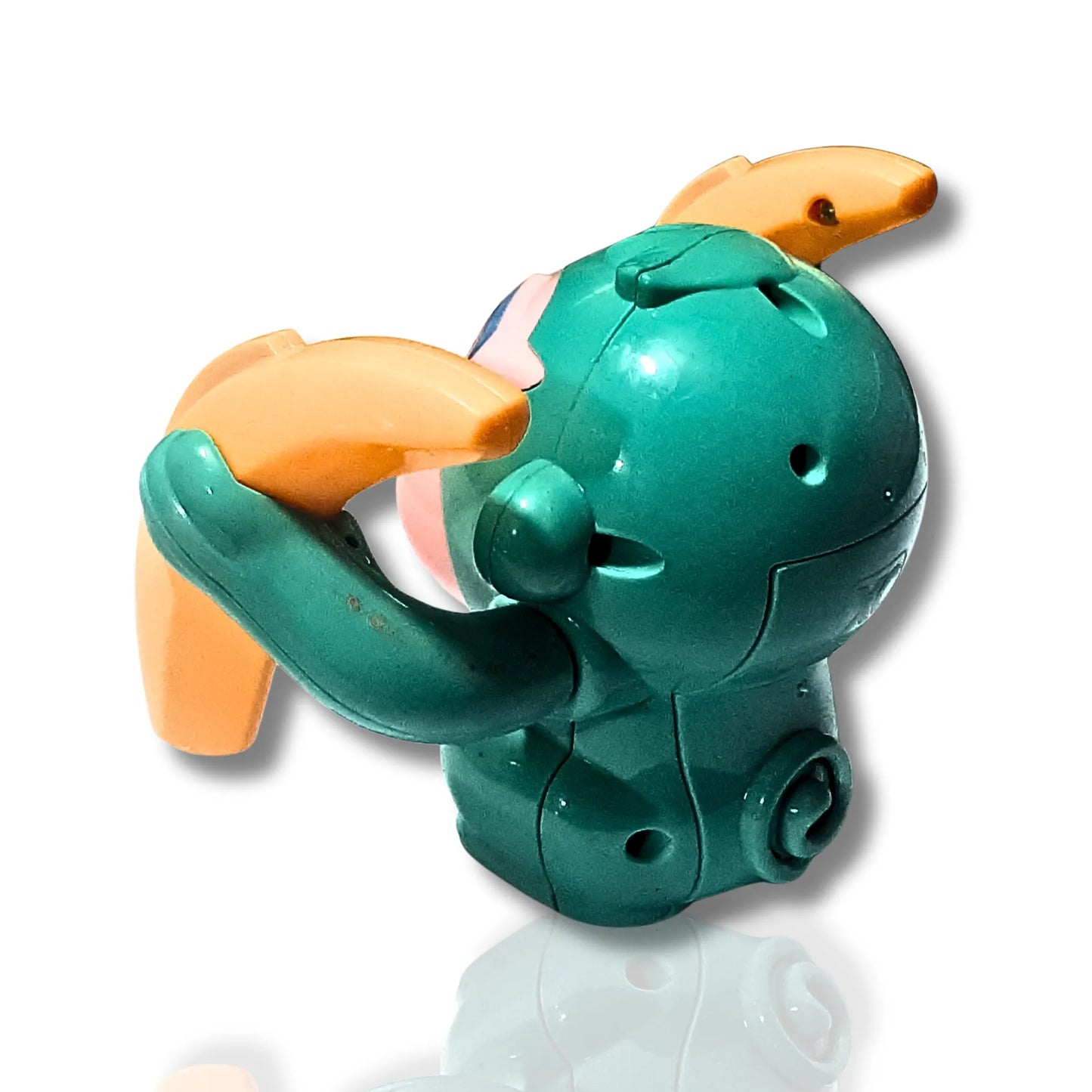 Side angle of musical monkey toy