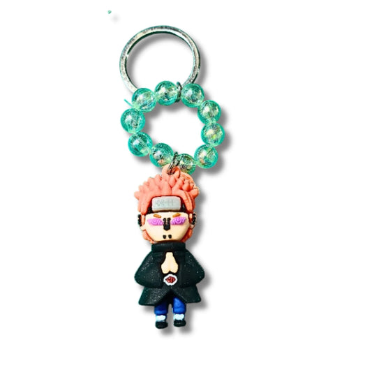 Orange-Haired Anime Ninja Character Keychain with Green Beaded Loop