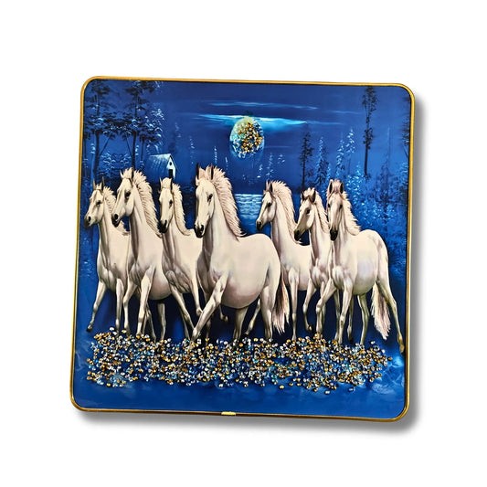 Decorative plate with a design of white horses on a blue background