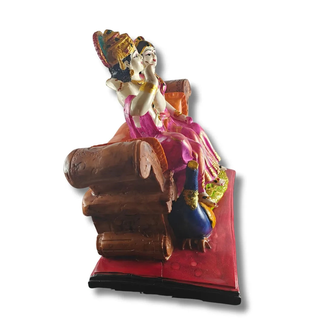 Radha Krishna Idol on Sofa with Peacock – Saadhya Decors