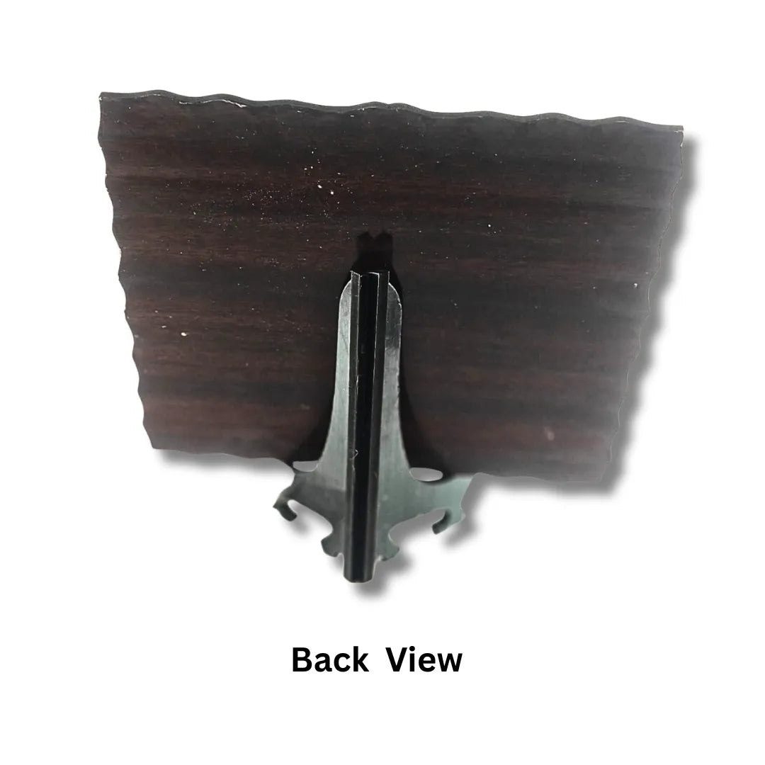 Wooden plaque with metal bracket on a white background