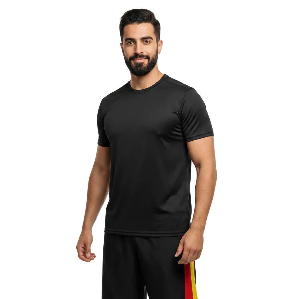 Man wearing a black athletic outfit with colorful stripes on a white background