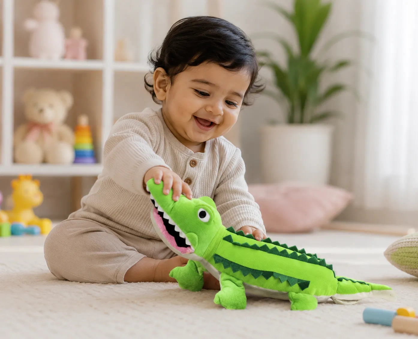 Child playing with a green toy alligator in a room with toys and plants.
