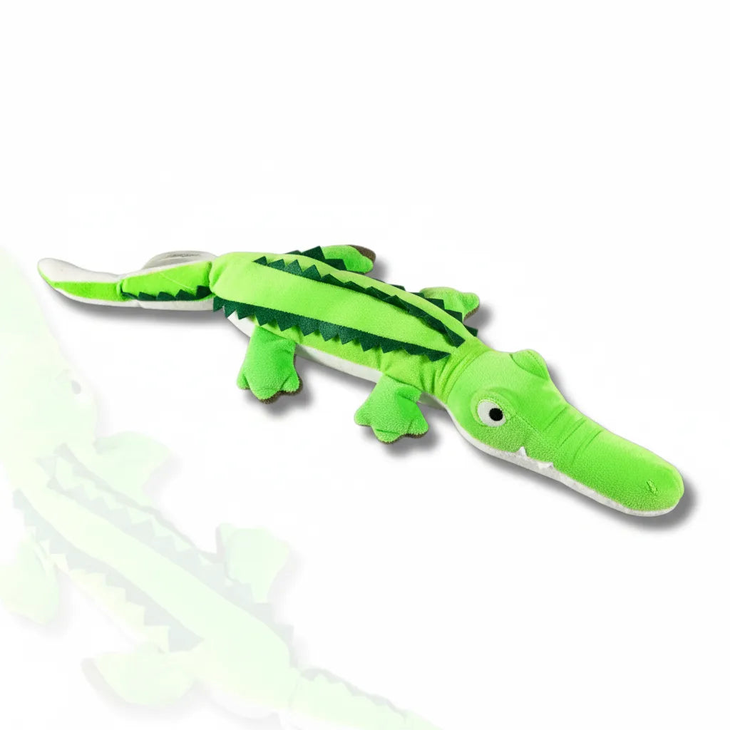 Green alligator plush toy on a white background