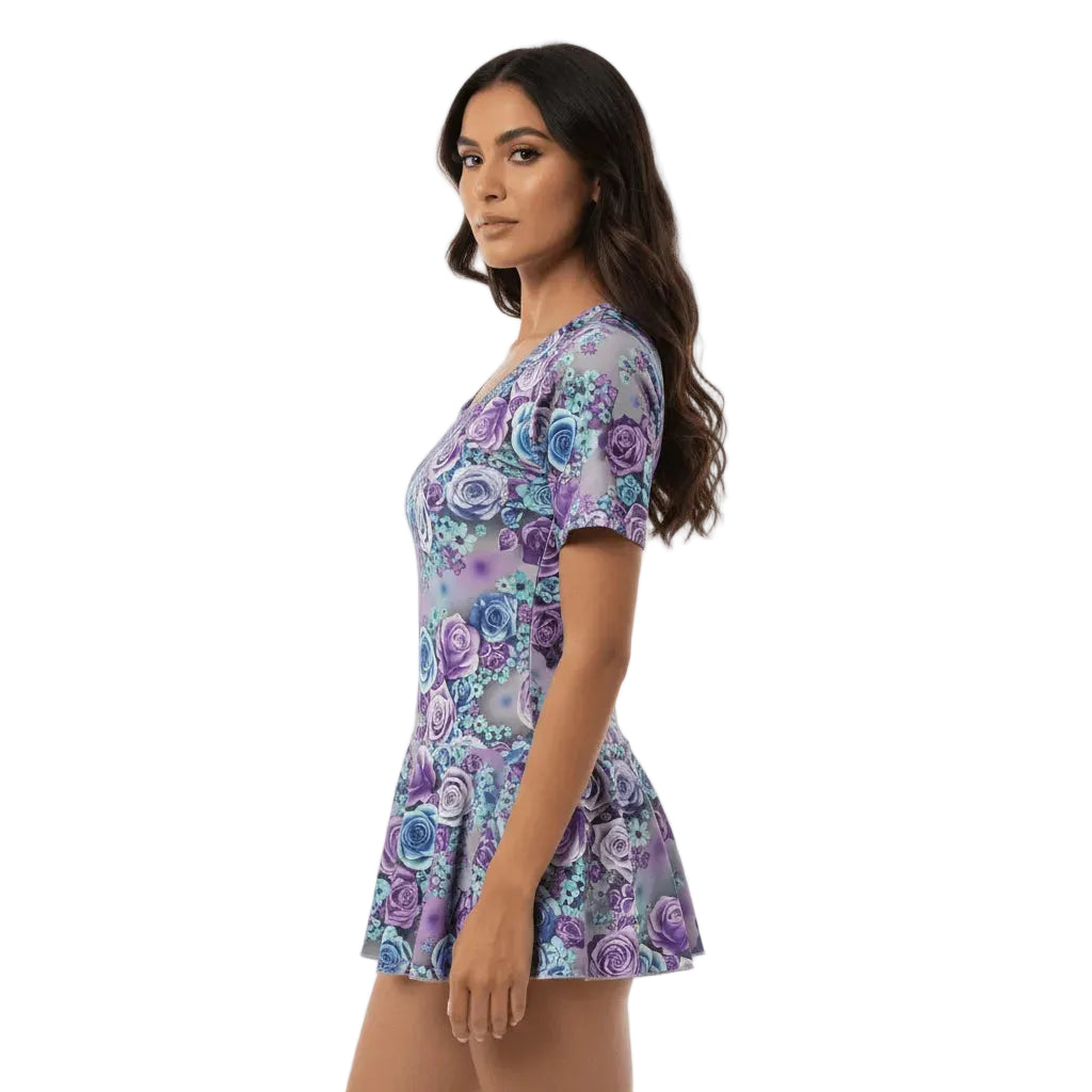 Woman wearing a floral dress with a white background