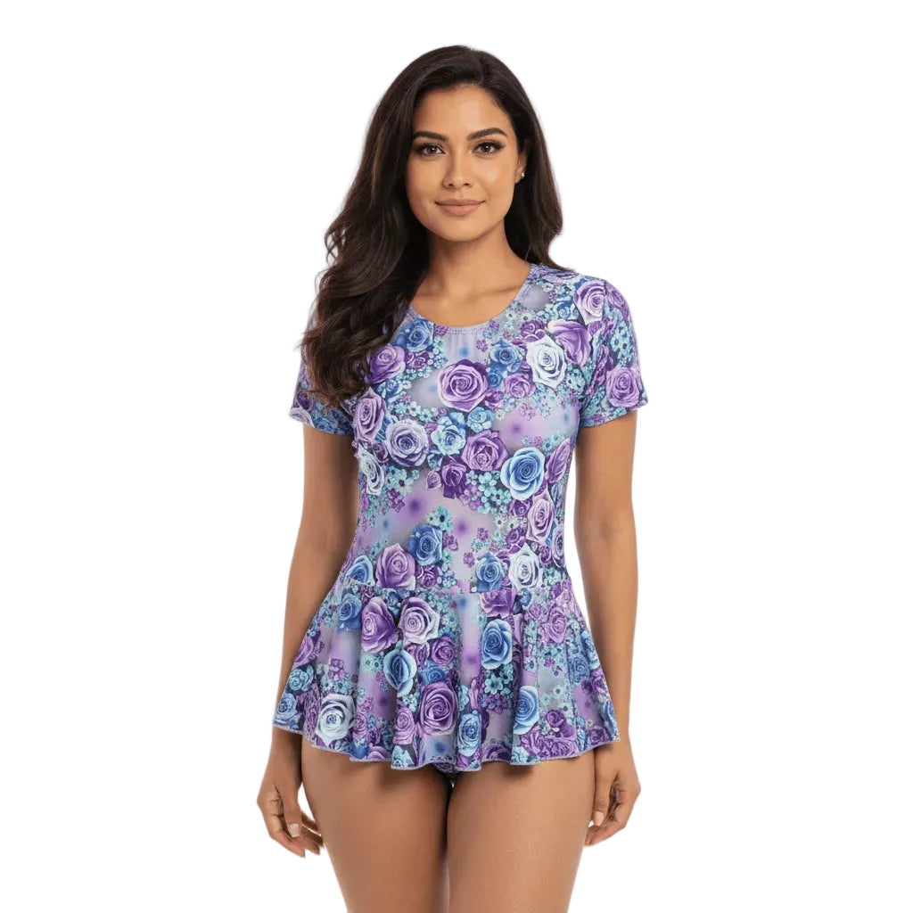 Woman wearing a purple floral dress on a white background