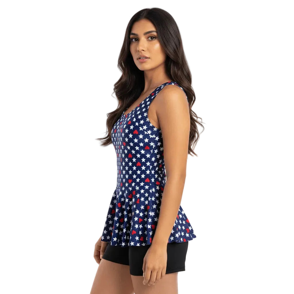 Woman wearing a sleeveless top with star pattern on a white background