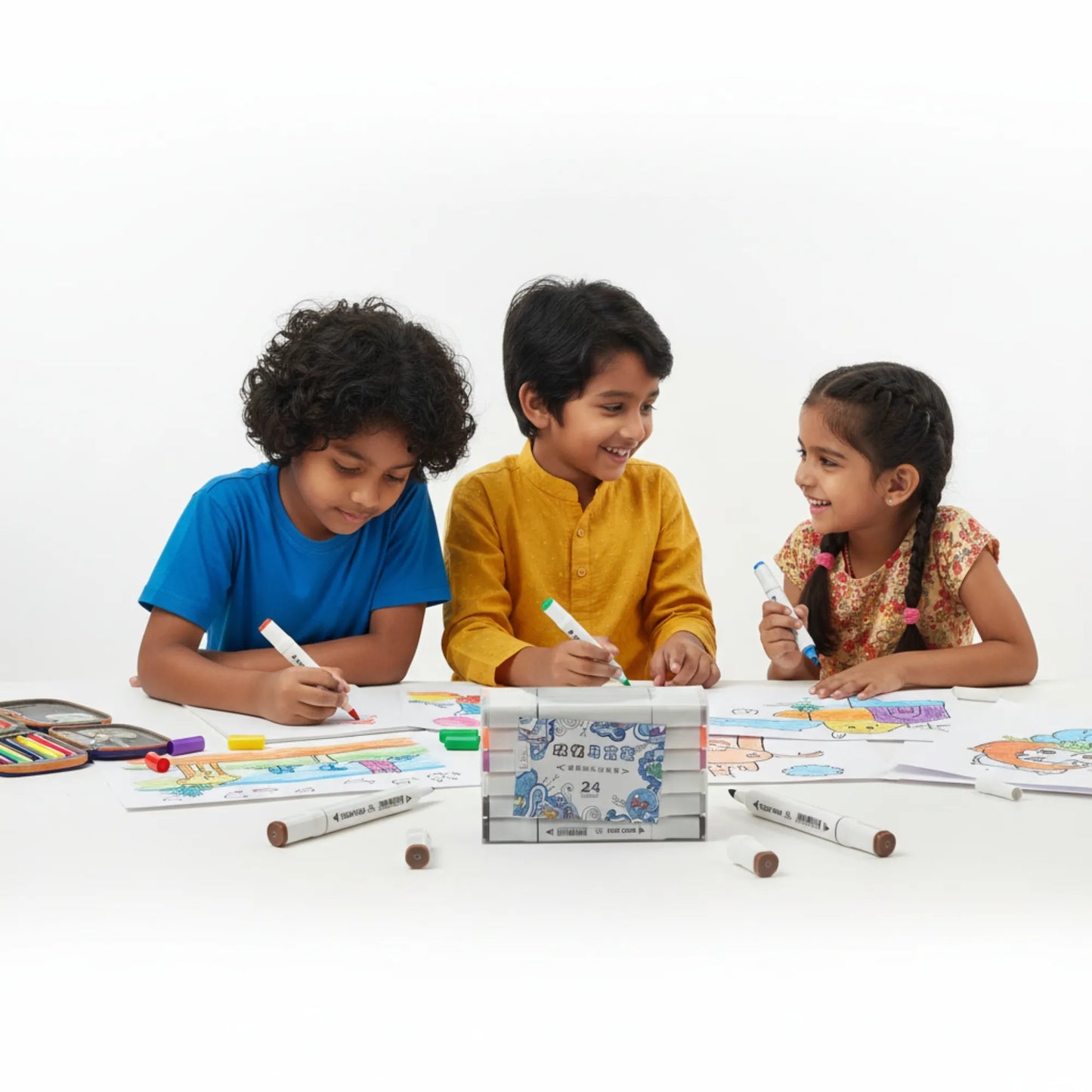 Three children sitting at a table with coloring books and markers on a white background