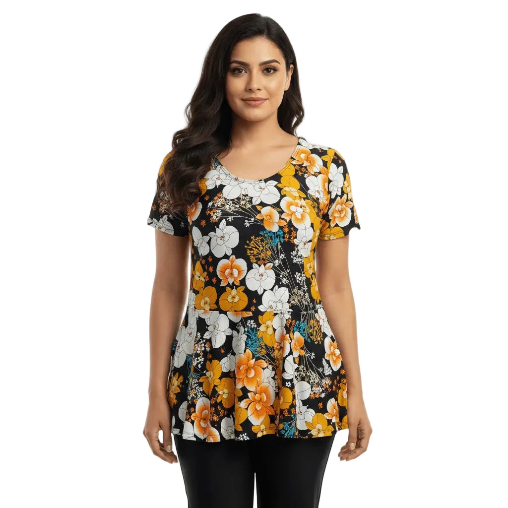 Woman wearing a floral patterned top on a white background