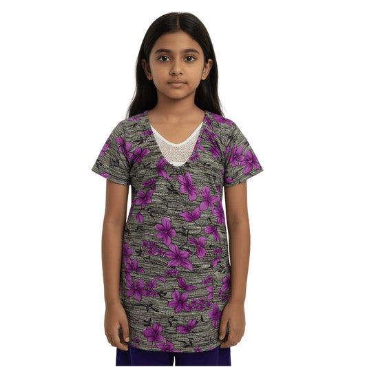 Young girl wearing a floral-patterned shirt on a white background