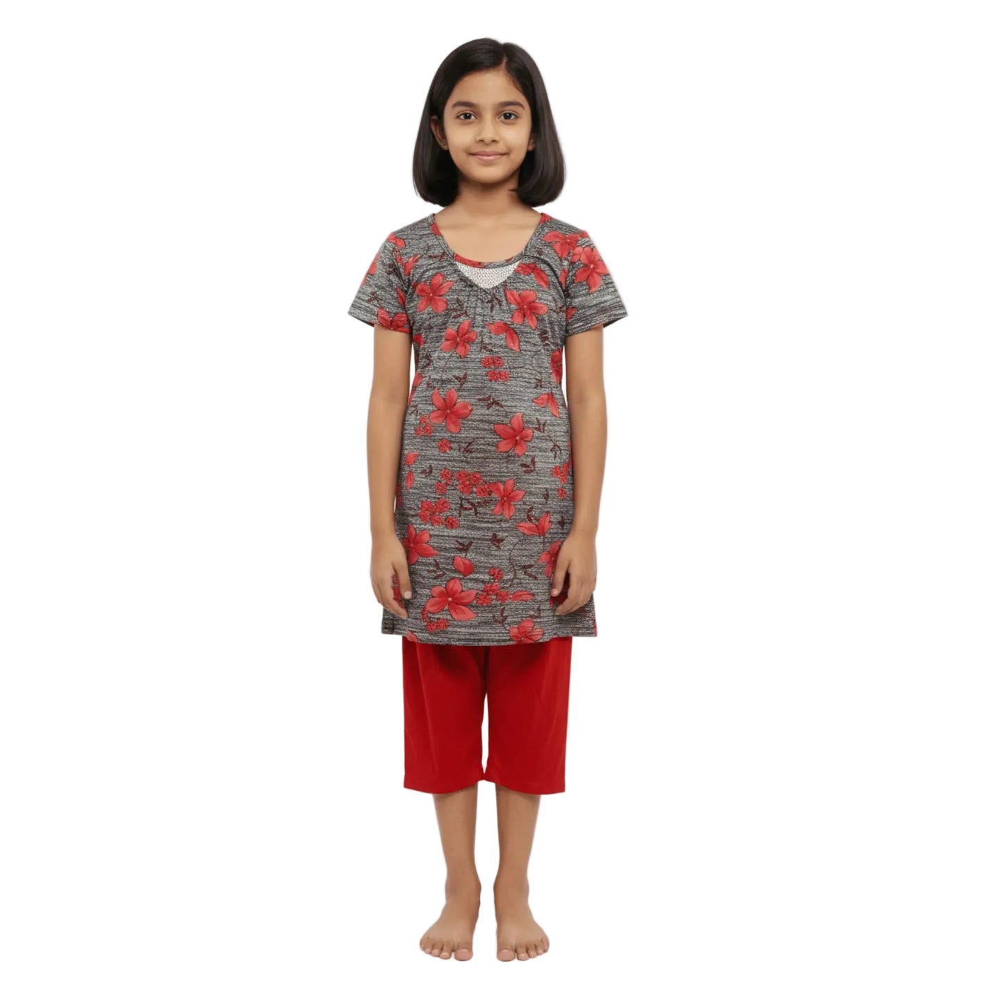 Girl wearing a gray floral top and red shorts on a white background
