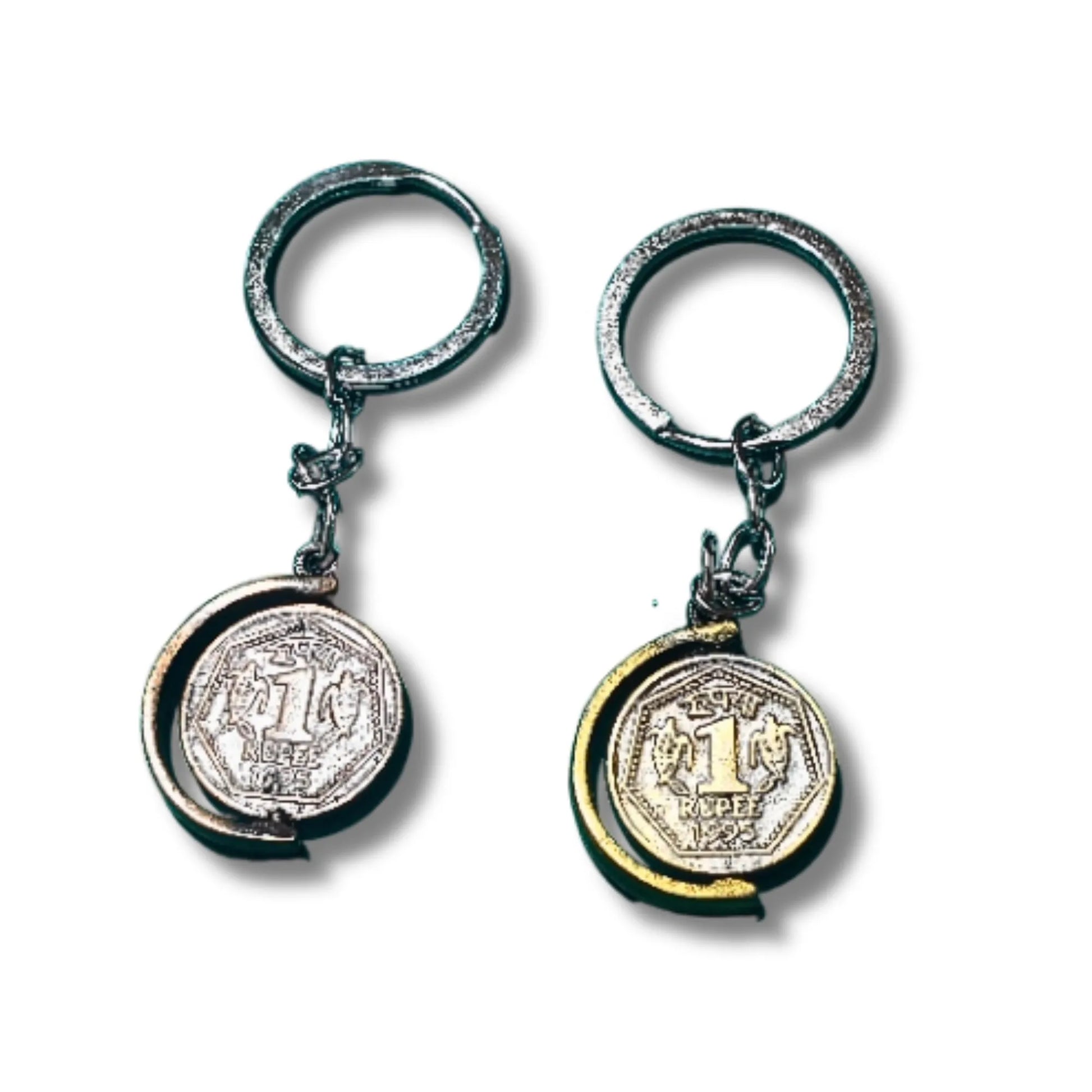 Front and back views of two vintage coin-style keychains