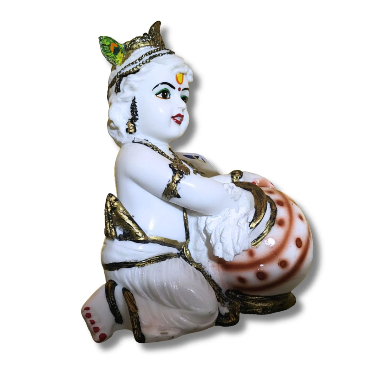 A white and gold Lord Krishna figurine playing a conch shell, set against a plain white background.