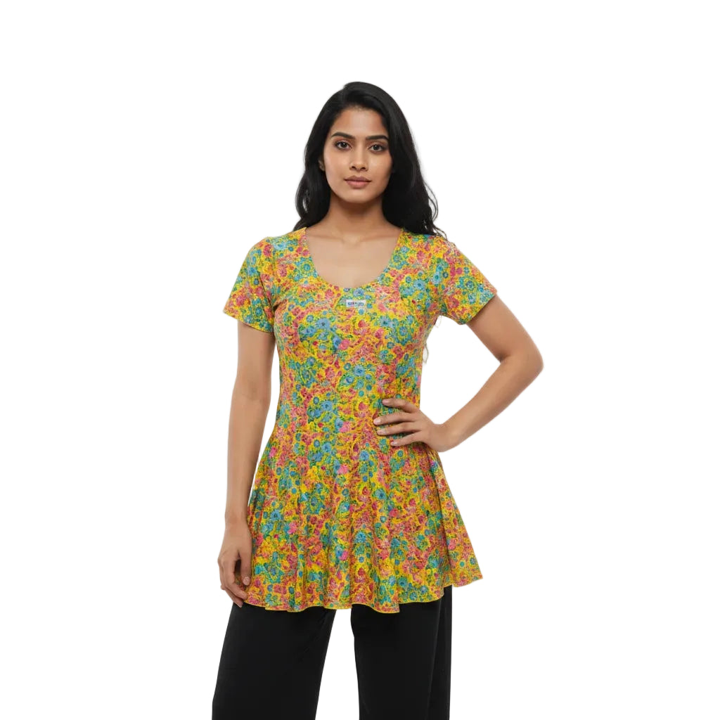 Woman wearing a colorful floral dress on a white background