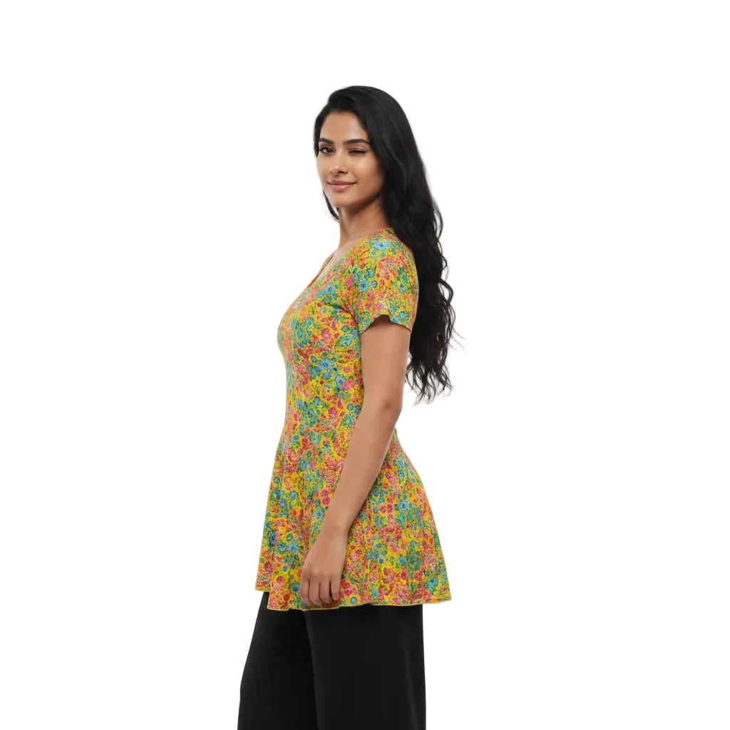 Woman wearing a colorful floral dress on a white background
