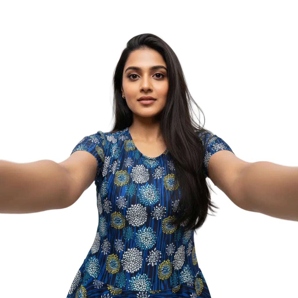Woman wearing a blue floral dress against a white background