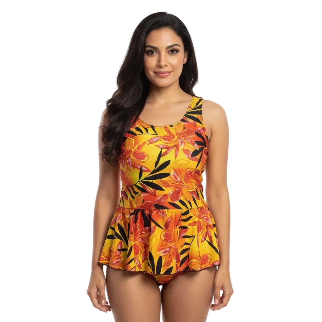Woman wearing a colorful floral swimsuit on a white background