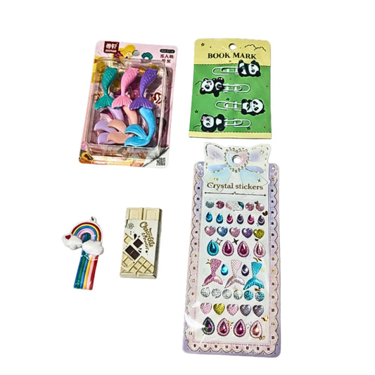 Collection of stationery items including mermaid tail hair clips, panda bookmarks, and crystal stickers on a white background.