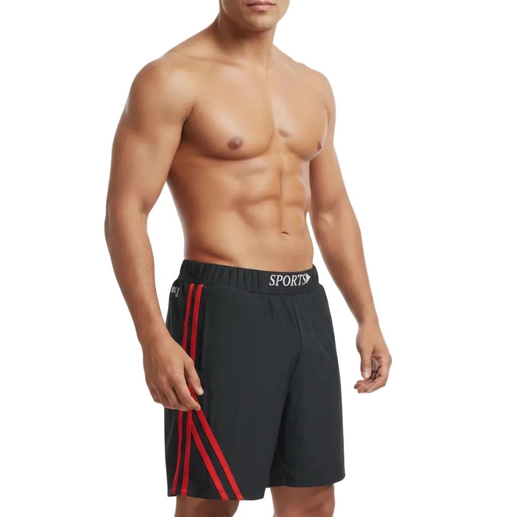Man wearing black shorts with red stripes on a white background