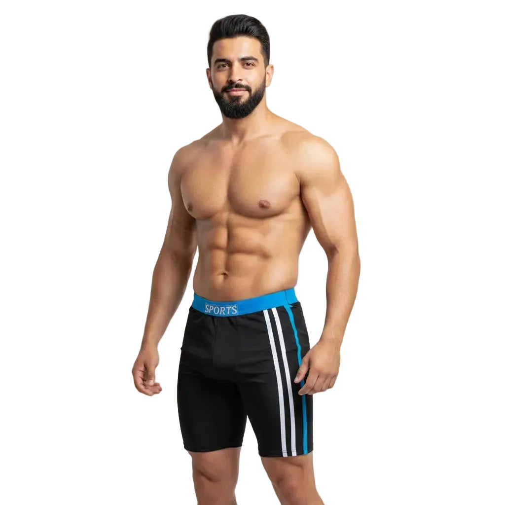 Man wearing black athletic shorts with blue waistband and white stripes on a light gray background