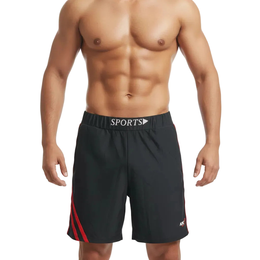 Man wearing black athletic shorts with a red stripe on a white background
